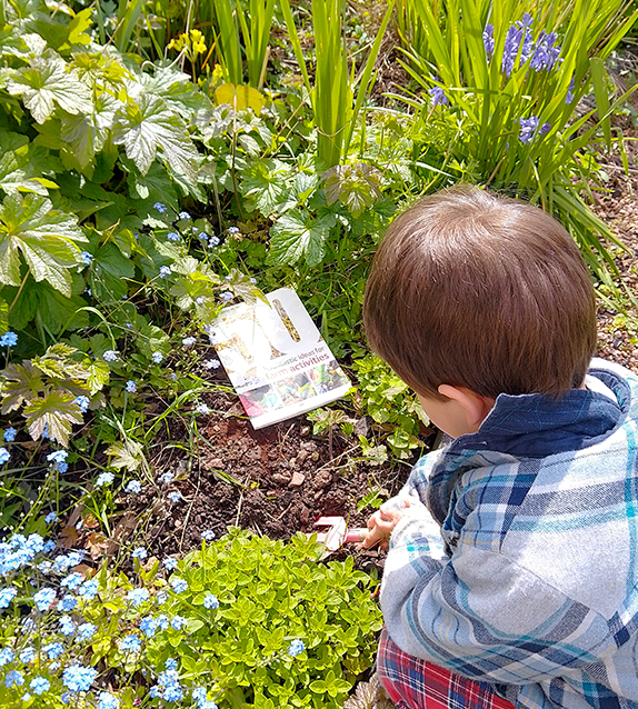 Child looking at book