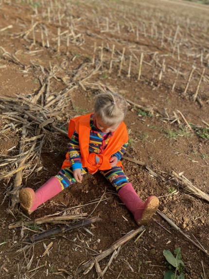 Child feeling the soil