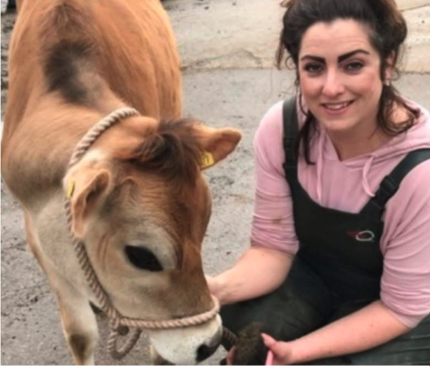 Farmer Holly with cow